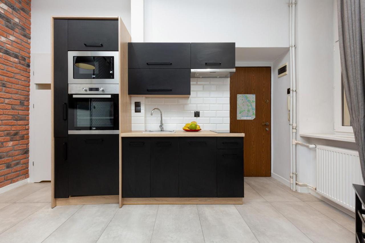 Downtown Studio Apartment Poznanska By Renters Варшава Экстерьер фото
